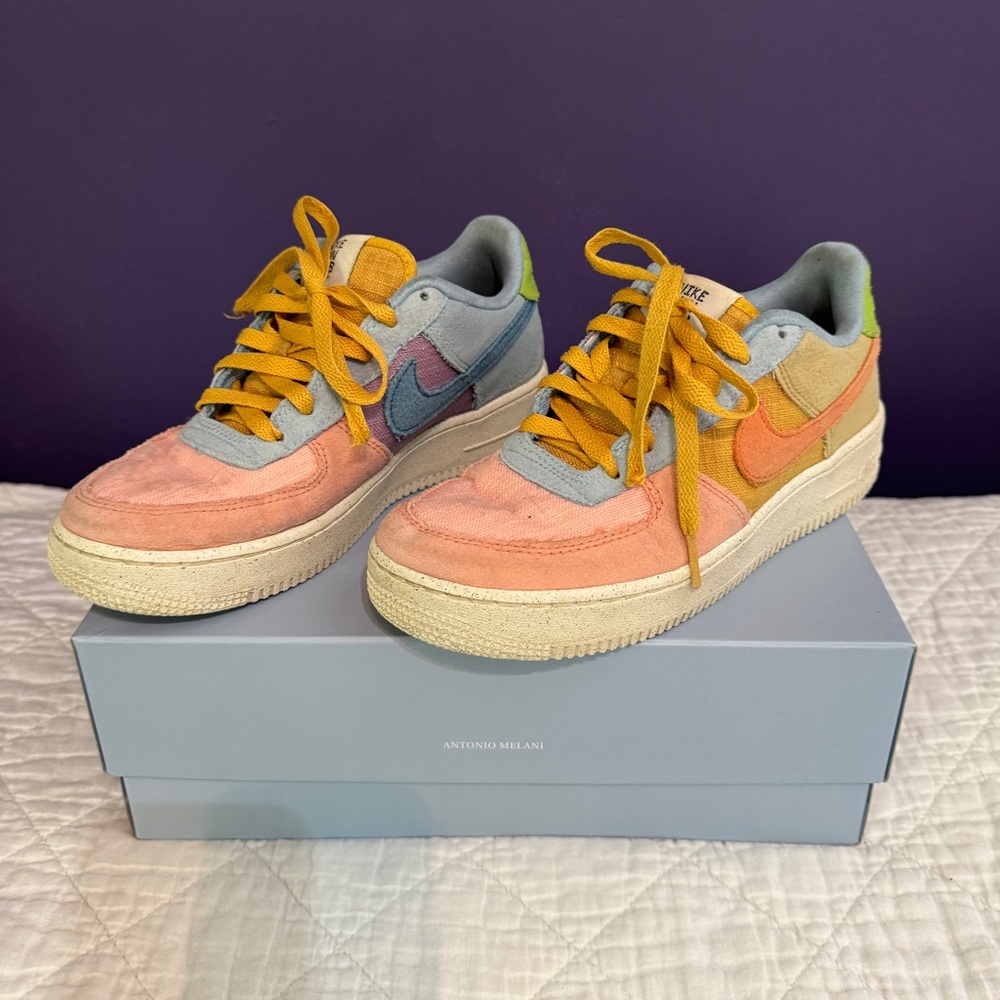 Nike Air Force 1 Low 07 LV8 Next Nature Sun Club multicolor sneakers.